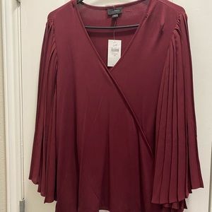 Beautiful pleated batwing sleeve wrap style top
